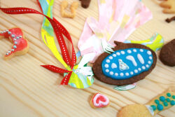Rule 34 | 1girl, aqua hair, blonde hair, blurry, blurry background, closed eyes, closed mouth, commentary request, cookie, dress, floating hair, food, from side, hair ribbon, hatsune miku, heart, holding, holding cookie, holding food, long hair, long sleeves, masking tape (medium), mixed media, multicolored hair, ojama mushi (vocaloid), original, photo (medium), pink dress, profile, red ribbon, ribbon, ryono, smile, solo, traditional media, unconventional media, very long hair, vocaloid