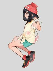 Rule 34 | 1girl, beanie, black hair, blush, closed mouth, floral print, fua1heyvot4ifsr, green eyes, green shorts, grey background, hat, highres, nintendo, pokemon, pokemon sm, red hat, selene (pokemon), shirt, short hair, short sleeves, shorts, simple background, sweat, sweatdrop, t-shirt, tied shirt, yellow shirt, z-ring