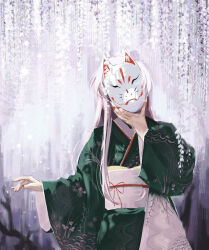 1girl alternate_costume cowboy_shot facing_viewer fox_mask green_kimono hand_up hashtag-only_commentary hata_no_kokoro highres holding holding_mask japanese_clothes kimono long_hair long_sleeves mask obi obijime ourie pink_hair red_nails sash sidelocks solo touhou very_long_hair white_sash