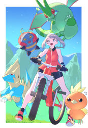 1girl bandana bicycle bike_shorts blue_eyes breasts brown_hair day flygon flying gen_3_pokemon green_bandana haska_(user_gure4787) highres jacket manectric mountainous_horizon nintendo open_mouth outdoors pokemon pokemon_(creature) pokemon_emerald pokemon_rse red_jacket riding riding_bicycle torchic volbeat