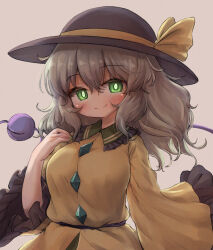 1girl arinu black_hat blush breasts bright_pupils buttons closed_mouth collared_shirt commentary diamond_button frilled_shirt_collar frilled_sleeves frills green_eyes grey_background grey_hair hair_between_eyes hat hat_ribbon highres komeiji_koishi large_breasts long_hair long_sleeves looking_at_viewer ribbon shirt sidelighting simple_background smile solo third_eye touhou upper_body white_pupils wide_sleeves yellow_ribbon yellow_shirt