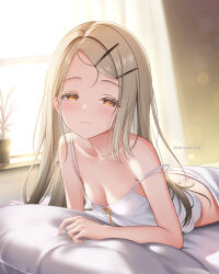 1girl akiei blonde_hair blush breasts camisole collarbone colored_eyelashes commentary_request crop_top gakuen_idolmaster highres idolmaster indoors light_smile long_hair looking_at_viewer lying on_stomach orange_eyes pillow plant potted_plant shinosawa_hiro small_breasts solo strap_slip sunlight twitter_username white_camisole