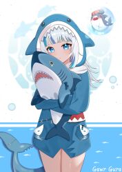 1girl absurdres animal_costume animal_hood bare_legs bloop_(gawr_gura) blue_eyes blue_hoodie blunt_bangs character_name crying fins fish_tail gawr_gura gawr_gura_(1st_costume) graduation highres hololive hololive_english hood hoodie long_sleeves looking_at_viewer multicolored_hair naa_jelly sad shark shark_costume shark_girl shark_hood shark_tail simple_background solo streaked_hair tail two_side_up virtual_youtuber