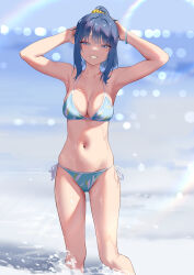 1girl absurdres ahoge bikini blue_bikini blue_eyes blue_hair blurry blurry_background breasts evan_(pixiv7510743) highres long_hair looking_at_viewer make_heroine_ga_oo_sugiru! medium_breasts navel ocean outdoors parted_lips ponytail rainbow side-tie_bikini_bottom smile solo swimsuit yanami_anna