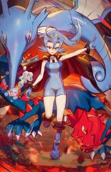 1girl absurdres black_cape blue_bodysuit blue_boots blue_eyes blue_gloves blue_hair blue_scales bodysuit boots breasts cape chest_jewel clair_(pokemon) commentary dragon druddigon english_commentary floating_hair full_body gen_2_pokemon gen_5_pokemon gloves hair_between_eyes highres kingdra leg_up long_hair medium_breasts nintendo outstretched_arm pokemon pokemon_(creature) pokemon_hgss ponytail red_eyes ryairyai