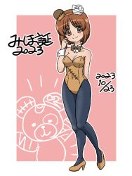 1girl 2023 animal_ears arm_behind_back bear_ears birthday black_pantyhose boko_(girls_und_panzer) bow bowtie breasts brown_bow brown_bowtie brown_eyes brown_hair brown_leotard brown_shoes character_name closed_mouth collar commentary dated detached_collar fake_animal_ears finger_to_face full_body girls_und_panzer heel_up high_heels leotard looking_at_viewer medium_breasts nishizumi_miho outline pantyhose pink_background playboy_bunny shoes short_hair smile solo standing strapless strapless_leotard takahashi_kurage translated white_collar white_outline wrist_cuffs