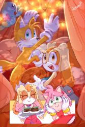 amy_rose animal_ears bed_sheet blonde_hair blue_eyes blush brown_eyes cake cake_slice chao_(sonic) cheese_(sonic) child cream_the_rabbit dress finn_ette food fox fox_ears fox_tail gloves green_eyes highres long_ears looking_back multiple_tails orange_fur orange_hair pillow pink_fur pink_hair rabbit sega sheet_grab sitting smile sonic_(series) tail tails_(sonic) two_tails vanilla_the_rabbit yellow_fur