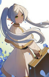 1girl absurdres blue_flower capelet commentary_request dress falling_petals flower frieren from_behind green_eyes highres holding holding_suitcase liago long_sleeves looking_at_viewer parted_lips petals pointy_ears solo sousou_no_frieren suitcase twintails white_background white_capelet white_dress white_hair