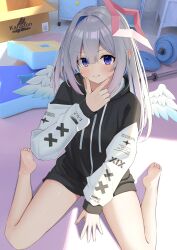 1girl absurdres alternate_costume amane_kanata angel_wings barefoot black_hoodie blue_eyes blush box brand_name_imitation cardboard_box closed_mouth dated_commentary feet finger_gun finger_to_own_chin gonza3_v grey_hair halo hand_up highres hololive hood hoodie indoors long_hair long_sleeves looking_at_viewer mini_wings pink_halo sitting smile soles solo star_halo virtual_youtuber wariza weights wings