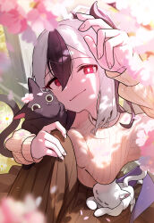 1girl black_hair blue_archive blurry blurry_foreground blush breasts brown_skirt cat cherry_blossoms closed_mouth commentary hair_between_eyes hand_up highres kayoko_(blue_archive) long_sleeves looking_at_viewer medium_breasts multicolored_hair nasan_(coldtime) purple_wings red_eyes single_wing sitting skirt solo streaked_hair two-tone_hair white_hair wings