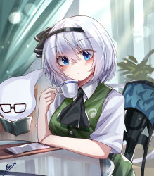1girl absurdres black_bow black_bowtie black_hairband book bow bowtie cup drinking green_skirt green_vest grey_hair hairband highres hitodama hitodama_print indoors konpaku_youmu konpaku_youmu_(ghost) looking_at_viewer reading short_hair sitting skirt skirt_set solo sword table teacup top-exerou touhou vest wakizashi weapon