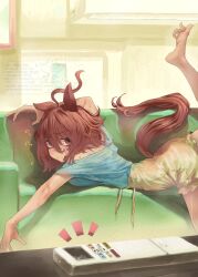 1girl ? absurdres agnes_tachyon_(umamusume) alternate_costume animal_ears arm_up barefoot bra_strap brown_hair closed_mouth clothing_cutout confused controller couch dated foot_up furrowed_brow hair_between_eyes high-waist_shorts highres horse_ears horse_girl horse_tail indoors lying medium_hair on_couch on_stomach outstretched_arm remote_control shirt shorts solo sweat table tail tail_through_clothes toes tonariuta umamusume watermark