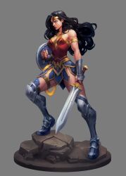 1girl armlet armored_boots black_hair blue_eyes boots circlet dc_comics full_body golden_armlet grey_background highres holding holding_shield holding_sword holding_weapon jewelry joe_madureira long_hair rock shield simple_background solo standing sword vambraces weapon wonder_woman