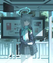 1girl absurdres animal_ears aqua_halo black_bag blue_archive blue_eyes blue_jacket blue_scarf clock commentary cowboy_shot digital_clock gloves green_gloves grey_hair halo hand_up highres holding_strap jacket looking_at_viewer medium_hair plaid_clothes plaid_skirt scarf school_uniform shiroko_(blue_archive) shirt skirt solo standing train_station white_shirt wolf_ears xianyusixu