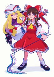 Rule 34 | 2girls, ascot, black shoes, blonde hair, blunt bangs, bow, brown hair, detached sleeves, dress, frills, gap (touhou), gohei, hair bow, hair tubes, hakurei reimu, hat, hat ribbon, holding, holding stick, iganashi1, legs apart, long hair, mary janes, mob cap, multiple girls, purple eyes, red shirt, red skirt, ribbon, ribbon-trimmed sleeves, ribbon trim, shirt, shoes, sidelocks, simple background, skirt, skirt set, socks, stick, touhou, white background, wide sleeves, yakumo yukari