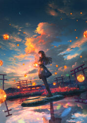 1girl black_boots black_dress black_hair black_pantyhose boots brown_eyes closed_mouth cloud commentary_request crescent_moon dress evening flower gem highres holding holding_gem long_hair moon mountainous_horizon original outdoors pantyhose power_lines red_flower reflection scenery shuu_illust signature sky solo spider_lily star_(sky) sunset torii