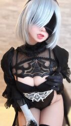 Rule 34 | 1girl, 2b (nier:automata), black leotard, blindfold, blue eyes, breasts, cleavage, cosplay, female focus, frills, gloves, hairband, japanese (nationality), leotard, licking lips, lipstick, looking at viewer, makeup, medium hair, mole, mole under mouth, nagomitei chu3, nier:automata, nier (series), photo (medium), real life, sitting, solo, solo focus, tongue, tongue out, underwear, white hair