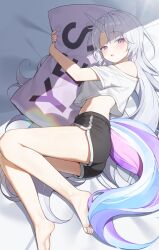 1girl ayatsuno_yuni bare_legs bare_shoulders barefoot black_shorts crop_top crop_top_overhang cross-shaped_pupils dolphin_shorts ekta highres horns horse_tail hugging_object long_hair looking_at_viewer lying midriff off_shoulder on_side open_mouth pillow pillow_hug purple_eyes shirt short_shorts short_sleeves shorts single_horn solo stellive symbol-shaped_pupils tail thighs toes unicorn_horn very_long_hair virtual_youtuber white_hair white_shirt