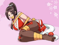 absurdres alternate_breast_size bound breasts brown_eyes brown_hair brown_pantyhose fatal_fury gag highres improvised_gag large_breasts lost_one_zero lying ninja pantyhose peril pink_background ponytail restrained revealing_clothes shiranui_mai stirrup_legwear tape tape_bondage tape_gag the_king_of_fighters toeless_legwear toes