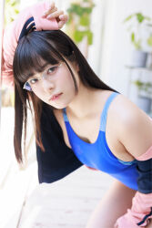 1girl black_hair blue_one-piece_swimsuit blurry blurry_background breasts glasses_on_head gravure_idol jacket japanese_(nationality) large_breasts looking_at_viewer looking_to_the_side medium_hair one-piece_swimsuit open_clothes open_jacket outdoors photo_(medium) shinonome_umi solo swimsuit