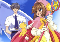 1990s_(style) 1boy 1girl :d antenna_hair blue_background blue_necktie blue_pants bow brown_hair cape capelet cardcaptor_sakura closed_eyes creature facing_viewer glasses gloves green_eyes grey_hair hair_intakes hat highres holding holding_wand hoshi_no_tsue kero_(cardcaptor_sakura) kinomoto_sakura kinomoto_sakura_(dream_sakura) looking_at_another magical_girl necktie official_art open_mouth orange_bow pants pink_cape pink_capelet pink_hat retro_artstyle scan school_uniform shirt short_hair smile takahashi_kumiko tsukishiro_yukito upper_body wand white_gloves white_shirt