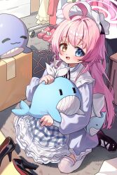 1girl :d absurdres ahoge alternate_costume apron black_shoes blue_archive blue_dress blue_eyes blush capry commentary dress from_above full-body_tattoo hair_flaps hair_intakes halo heterochromia highres hoshino_(blue_archive) huge_ahoge indoors inflatable_toy inflatable_whale long_hair long_sleeves looking_at_viewer maid_headdress open_mouth orange_eyes pink_hair pink_halo shoes sidelocks sitting smile solo stuffed_whale symbol-only_commentary tattoo thighhighs unworn_clothes unworn_shoe very_long_hair white_thighhighs