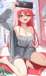 1girl :d absurdres ahoge alternate_costume arm_up barefoot between_legs breasts camisole cleavage commentary_request day double-parted_bangs frilled_shorts frills grey_camisole grey_jacket grey_shorts hair_between_eyes hand_between_legs handheld_game_console high-waist_shorts highres holding holding_handheld_game_console hololive indoors jacket large_breasts long_hair looking_at_viewer loungewear nintendo_switch on_floor open_mouth pink_hair sakura_miko shorts single_off_shoulder sitting smile solo strap_slip teeth thomas_8000 upper_teeth_only virtual_youtuber wariza