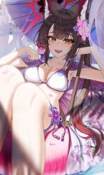 1girl absurdres animal_ear_fluff animal_ears arch_a4 armpits bikini black_hair blue_archive blurry blush breasts brown_eyes cape cleavage collarbone commentary_request depth_of_field fang flower fox_ears fox_girl hair_flower hair_ornament hands_up highres innertube large_breasts long_hair looking_at_viewer oil-paper_umbrella open_mouth parasol sidelocks sitting smile solo string_bikini swim_ring swimsuit umbrella wakamo_(blue_archive) wakamo_(swimsuit)_(blue_archive) white_bikini
