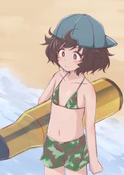 1girl akiyama_yukari alternate_breast_size backwards_hat baseball_cap beach bikini bikini_shorts blue_hat brown_eyes brown_hair camouflage camouflage_bikini closed_mouth commentary flat_chest girls_und_panzer hat hazuki_haru highres holding inflatable_toy messy_hair navel short_hair shorts smile solo standing swimsuit tank_shell