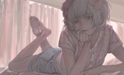 1girl alternate_costume arm_support backlighting barefoot buttons casual chinese_commentary closed_mouth commentary_request curtains day denim denim_shorts feet_up flower hair_flower hair_ornament half-closed_eyes hand_on_own_chin head_rest highres indoors kudou_chitose looking_at_viewer lying nijisanji on_stomach overexposure pink_flower pink_lips pink_shirt plaid_clothes plaid_shirt qunqing123 shirt short_hair short_sleeves shorts solo virtual_youtuber white_hair yellow_eyes
