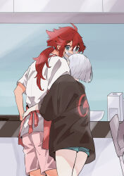Rule 34 | 2girls, absurdres, apron, black shirt, blue eyes, blue shorts, clothes writing, commentary request, gundam, gundam suisei no majo, highres, hug, hug from behind, indoors, kusattatofu, long hair, miorine rembran, multiple girls, pink apron, pink shorts, ponytail, red hair, shirt, short hair, shorts, suletta mercury, thick eyebrows, white-framed eyewear, white shirt, yuri