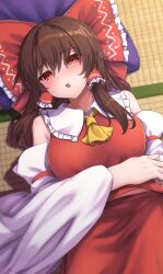 1girl arm_under_breasts ascot bare_shoulders blush bow brown_hair commentary_request cowboy_shot detached_sleeves frilled_bow frilled_hair_tubes frilled_shirt_collar frills hair_between_eyes hair_bow hair_spread_out hair_tubes hakurei_reimu head_on_pillow head_tilt highres huge_bow indoors long_hair long_sleeves looking_at_viewer lying on_back open_mouth pillow red_bow red_eyes red_shirt red_skirt shirt sidelocks skirt sleepy sleeveless sleeveless_shirt solo straight_hair tatami touhou wide_sleeves yellow_ascot yosshy