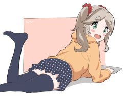 1girl :d aayh black_skirt black_thighhighs brown_background brown_hair brown_hoodie commentary_request fang green_eyes hair_ornament hair_scrunchie hood hood_down hoodie inuyama_akari leg_up long_hair looking_at_viewer looking_back lying no_shoes on_stomach open_mouth parted_bangs pleated_skirt polka_dot polka_dot_skirt red_scrunchie scrunchie short_eyebrows skirt smile solo tablet_pc thick_eyebrows thighhighs twintails two-tone_background unmoving_pattern white_background yurucamp