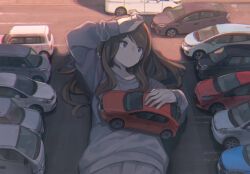 1girl brown_eyes brown_hair car chromatic_aberration commentary_request expressionless giant giantess grey_shirt hand_on_own_forehead hand_up holding long_hair long_sleeves looking_to_the_side lying motor_vehicle on_back on_ground original parking_lot shade shirt solo tomioka_jirou upper_body