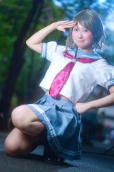 1girl bag blue_eyes breasts brown_hair cosplay cosplay_photo grey_hair love_live! love_live!_sunshine!! midriff photo_(medium) real_life school_bag school_uniform serafuku short_hair skirt solo stomach uranohoshi_school_uniform watanabe_you
