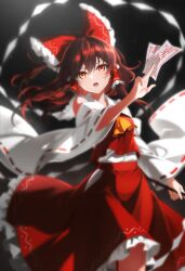 1girl absurdres ascot bare_shoulders between_fingers black_background bow brown_hair buttons collared_shirt commentary_request cowboy_shot detached_sleeves floating_clothes floating_hair frills gohei gradient_background grey_background hair_between_eyes hair_bow hair_ornament hair_tubes hakurei_reimu hand_up highres holding holding_gohei holding_ofuda long_hair long_sleeves looking_at_viewer nontraditional_miko ofuda open_mouth red_bow red_eyes red_skirt red_vest shide shirt sidelocks simple_background skirt skirt_set sleeveless sleeveless_shirt solo standing taigaphan teeth touhou v-shaped_eyebrows vest white_shirt white_sleeves wide_sleeves yellow_ascot