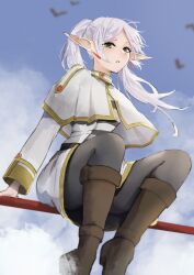 1girl absurdres boots day earrings elf flying frieren green_eyes hazuki_kono highres jewelry knee_boots long_hair outdoors pointy_ears sitting sky solo sousou_no_frieren twintails white_hair