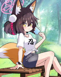 1girl animal_ears blue_archive food fox_ears fox_tail fukamiki_kei halo highres izuna_(blue_archive) outdoors pink_halo shirt shorts solo tail white_shirt yellow_eyes