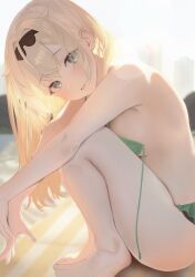 1girl absurdres barefoot beach bikini black_hairband blonde_hair blurry blurry_background breasts commentary day double-parted_bangs english_commentary green_bikini hair_between_eyes hairband highres hololive kazama_iroha knees_to_chest long_hair looking_at_viewer medium_breasts nekoi_(nekoi_0116) outdoors parted_lips solo squatting swimsuit untied_bikini_top virtual_youtuber