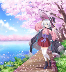 Rule 34 | 1girl, ahoge, black boots, black coat, black hat, blue sky, boots, cherry blossoms, cloud, coat, coat on shoulders, detached sleeves, elaina (majo no tabitabi), falling petals, full body, grey hair, hair between eyes, hat, long hair, long sleeves, looking at viewer, majo no tabitabi, official art, open clothes, open coat, outdoors, parted lips, petals, red skirt, skirt, sky, solo, standing, thighhighs, white thighhighs, wide sleeves, witch, witch hat, zettai ryouiki