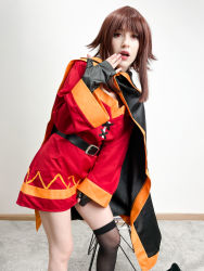 Rule 34 | 1girl, absurdres, asymmetrical legwear, belt, black cape, black gloves, black socks, blunt bangs, breasts, brown hair, cape, carpet, chair, cosplay, cosplay photo, covering privates, covering crotch, dress, eyeliner, feet out of frame, fingerless gloves, gloves, highres, kneehighs, kono subarashii sekai ni shukufuku wo!, lips, long sleeves, looking at viewer, makeup, medium hair, megumin, megumin (cosplay), mole, mole on breast, open mouth, photo (medium), red dress, red eyes, sidelocks, socks, standing, stelarhoshi, teeth, upper teeth only, wall