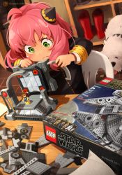 1girl absurdres anachronism anya_(spy_x_family) black_dress bond_(spy_x_family) chair child commentary dog dress eden_academy_school_uniform english_commentary frown fukouna_shoujo_03 great_pyrenees green_eyes hairpods highres khyle. lego lego_minifig logo millenium_falcon millennium_falcon model_building on_chair patreon_logo patreon_username pink_hair red_footwear school_uniform sitting solo spy_x_family star_wars star_wars:_the_rise_of_skywalker the_lego_group toy watermark web_address white_dog