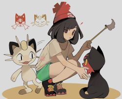 1girl 950magi618 beanie black_hair cat_teaser gen_1_pokemon gen_7_pokemon green_shorts hat highres holding litten looking_at_viewer meowth nintendo open_mouth pokemon pokemon_(creature) pokemon_sm red_hat selene_(pokemon) shirt short_hair short_sleeves shorts t-shirt yellow_shirt