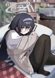 1girl absurdres black_hair black_pantyhose blue_archive blue_eyes blush book brown_cardigan cardigan closed_mouth glasses grey_halo hairband halo highres holding holding_book indoors kilabo long_hair looking_at_viewer no_shoes pantyhose purple_hairband round_eyewear sitting solo ui_(blue_archive)