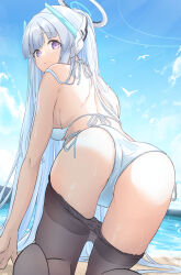 1girl absurdres ass beach bikini black_pantyhose blue_archive blush breasts closed_mouth clothes_pull day grey_hair halo highres large_breasts long_hair looking_at_viewer looking_back mechanical_halo noa_(blue_archive) ocean ogura_toast outdoors pantyhose pantyhose_pull purple_eyes solo swimsuit white_bikini