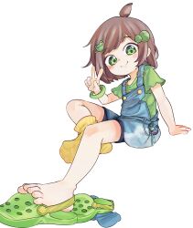 1girl barefoot blue_overalls brown_hair chaosexceed closed_mouth commentary crocs green_eyes green_shirt highres indie_virtual_youtuber lily_hopkins looking_at_viewer overalls paid_reward_available shirt short_sleeves simple_background sitting smile socks solo toes v white_background