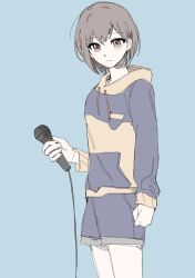 1girl bang_dream! bang_dream!_it&#039;s_mygo!!!!! blue_background blue_hoodie blue_shorts brown_eyes closed_mouth commentary cowboy_shot grey_hair highres holding holding_microphone hood hoodie long_sleeves microphone misumi_suki short_hair shorts simple_background solo takamatsu_tomori two-tone_hoodie yellow_hoodie