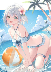 1girl :d aqua_eyes ball beachball bikini blue_bikini blue_sky blush breasts cleavage cloud cloudy_sky commission flower frilled_bikini frills green_eyes grey_hair hair_flower hair_ornament heterochromia highres medium_breasts open_mouth original outdoors palm_tree short_hair skeb_commission sky smile solo swimsuit tree water yoshino_ryou