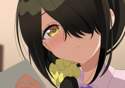 1girl black_hair blurry blurry_background blush closed_mouth commentary_request dot_nose hair_ornament hair_over_one_eye hair_scrunchie holding looking_at_object official_style scrunchie shiunji-ke_no_kodomotachi shiunji_kotono solo upper_body yellow_eyes yutsuki_warabi