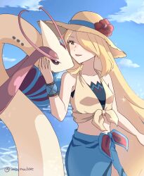 1girl beach blonde_hair blue_sarong blue_sky brown_hat cloud crop_top cynthia_(pokemon) cynthia_(summer_2025)_(pokemon) flower gen_3_pokemon hair_over_one_eye hair_over_shoulder hat hat_flower highres long_hair looking_at_another midriff milotic moka_(sub_mochat) nintendo ocean official_alternate_costume open_mouth outdoors pokemon pokemon_(creature) pokemon_masters_ex sarong sky sun_hat twitter_username very_long_hair